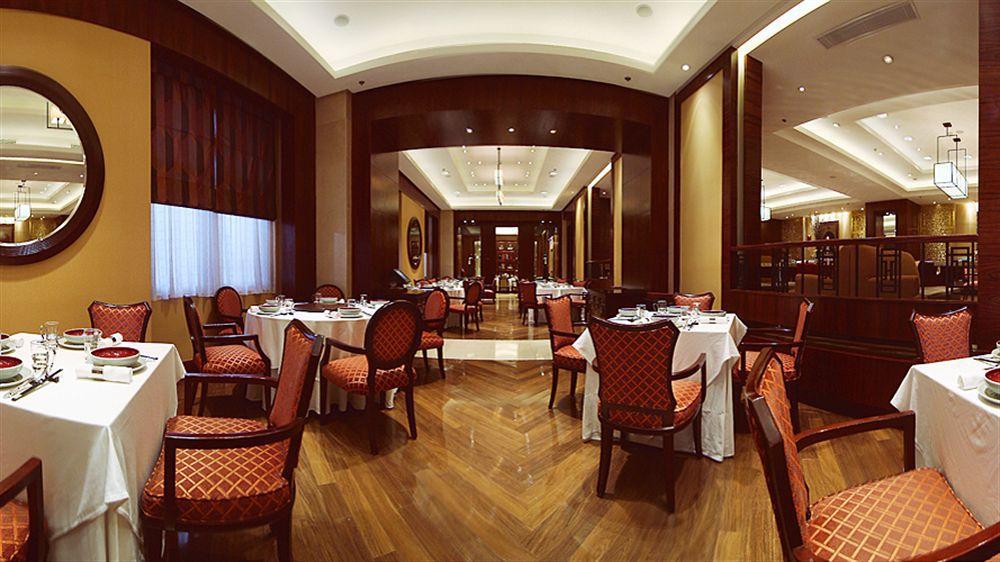 New Coast Hotel Manila Exterior foto The restaurant