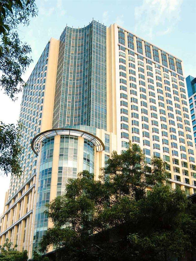 New Coast Hotel Manila Exterior foto The building of the National University of Singapore