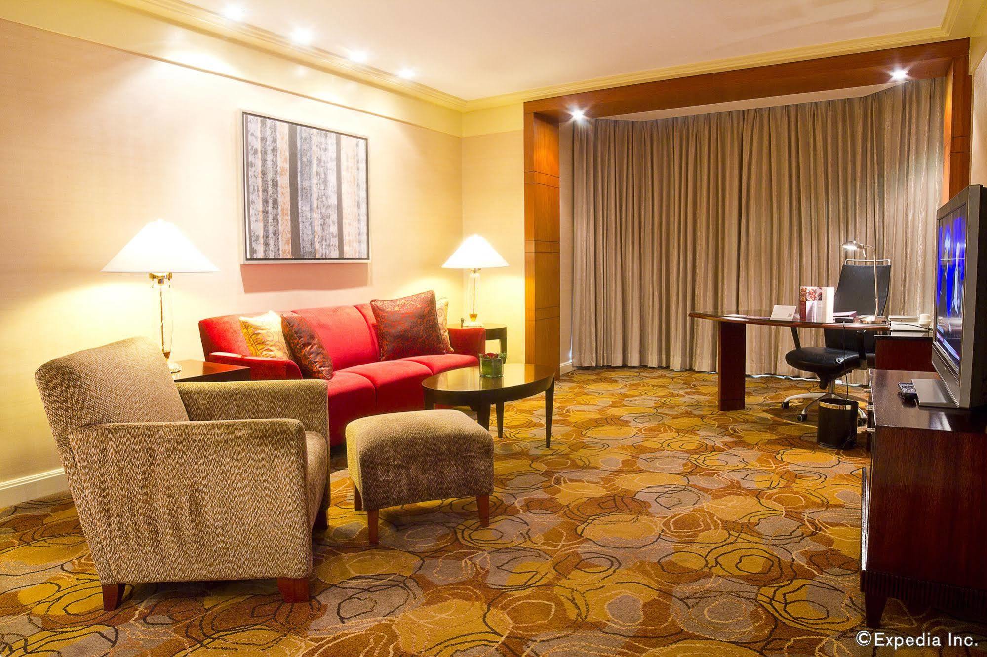 New Coast Hotel Manila Exterior foto A suite at the hotel