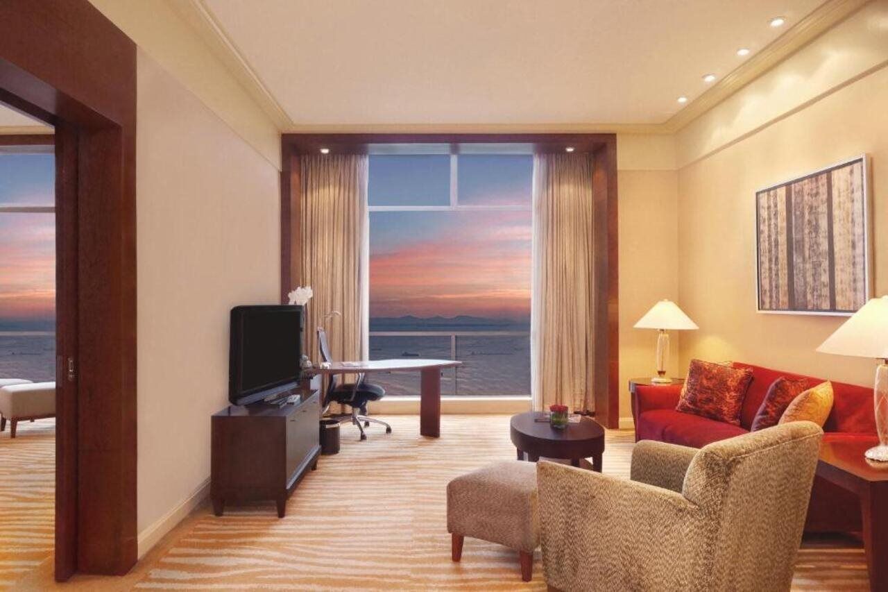 New Coast Hotel Manila Exterior foto Living room